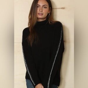 Dylan Black Turtleneck Sweater with White Stitching
